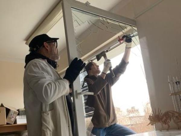 Workers repairing the damage in Natalia Gerasimenko's laboratory.